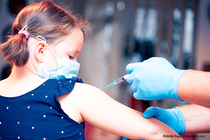 child being vaccinated